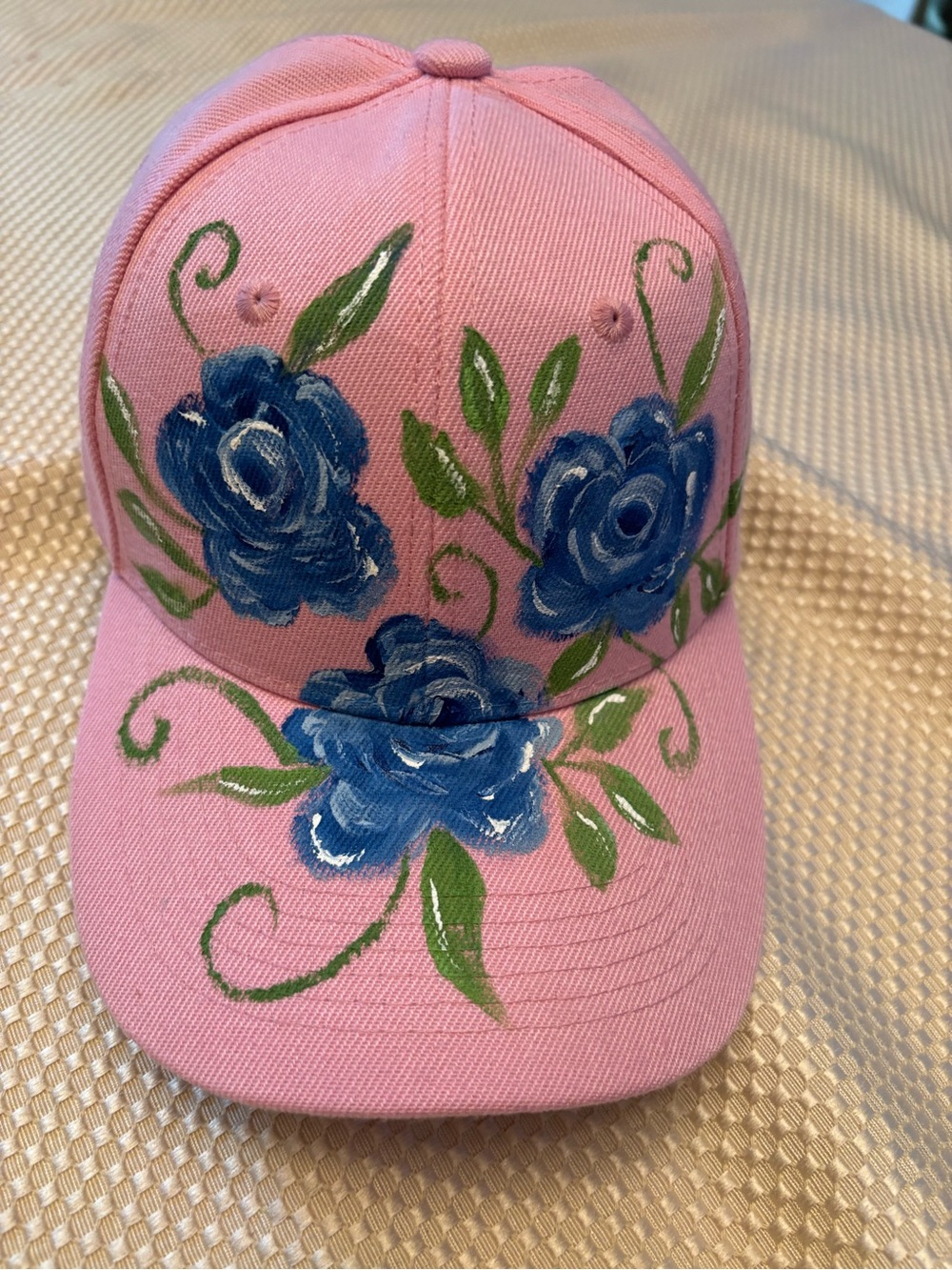 Hand-Painted Pink Baseball Cap with Blue Floral Design